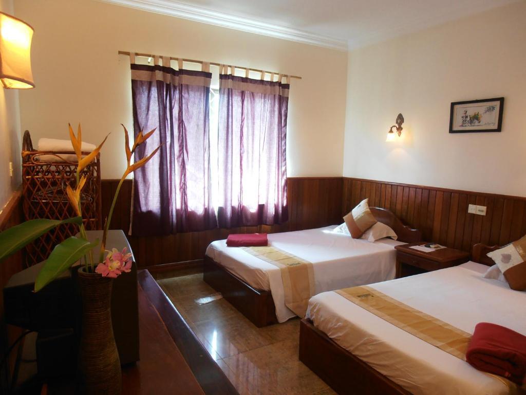 Firefly Guesthouse - The Berlin Angkor Siem Reap Ruang foto